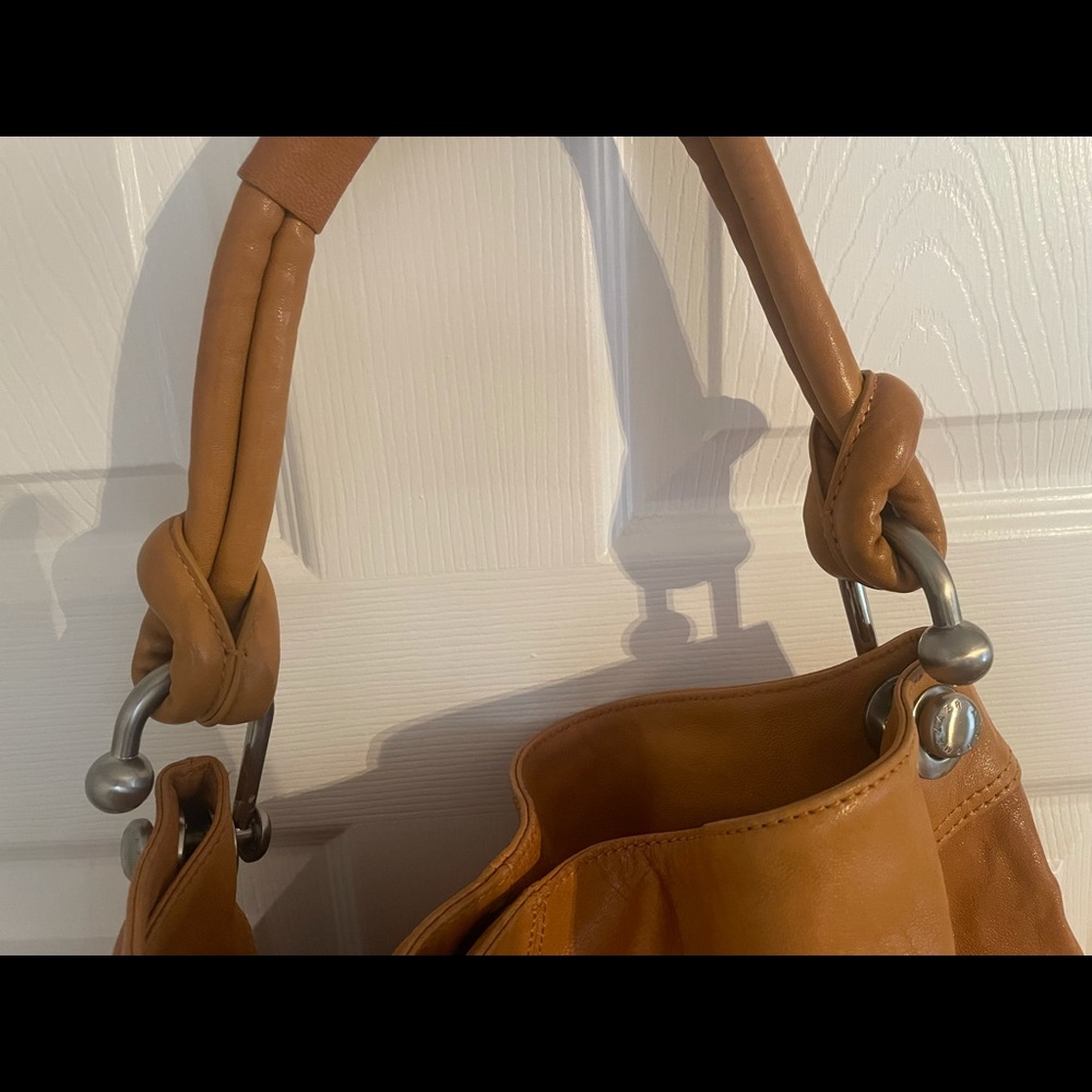 Brand new beautiful BCBG pocketbook. Cognac color great bag